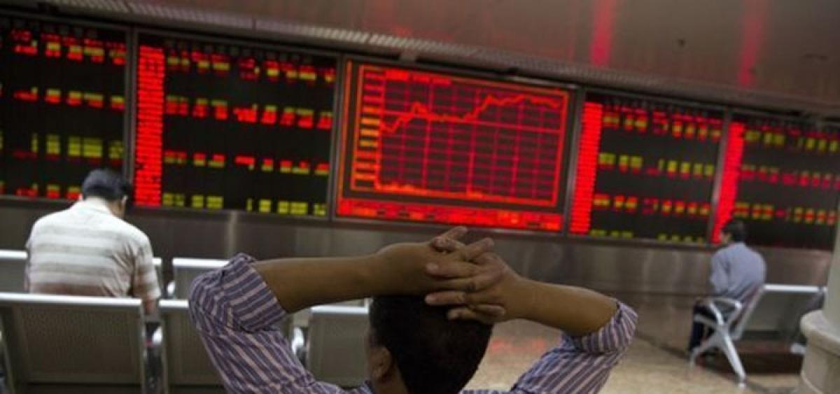 Global markets push higher after week darkened by terror